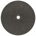 Tylna, czarna strona tarczy do cięcia metalu i stali nierdzewnej STONER 230 × 1,8 × 22,2 mm – widoczna struktura materiału ściernego oraz centralny otwór montażowy.